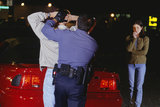Teenage boy (16-17) being arrested Titus Law 5755 North Point Parkway Suite 82 