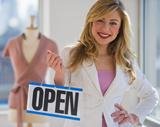 female clothing store worker opening up shop NEWS Insurance Services, Inc 2072 Orchard Drive, Suite A 