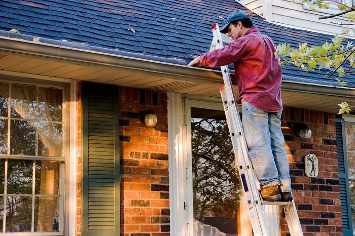 Man Cleaning Gutters on a Ladder Against a Brick House Profile Photos of Roof Gutter Cleaning Melbourne PO Box 481 East Melbourne VIC 3002 - Photo 1 of 4 Man Cleaning Gutters on a Ladder Against a Brick House Profile Photos of Roof Gutter Cleaning Melbourne PO Box 481 East Melbourne VIC 3002 - Photo 1 of 4