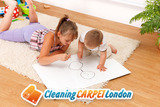 Brother watching his sister drawing on white sheet in the room Cleaning Carpet London Ltd. 13 Copeland Rd 