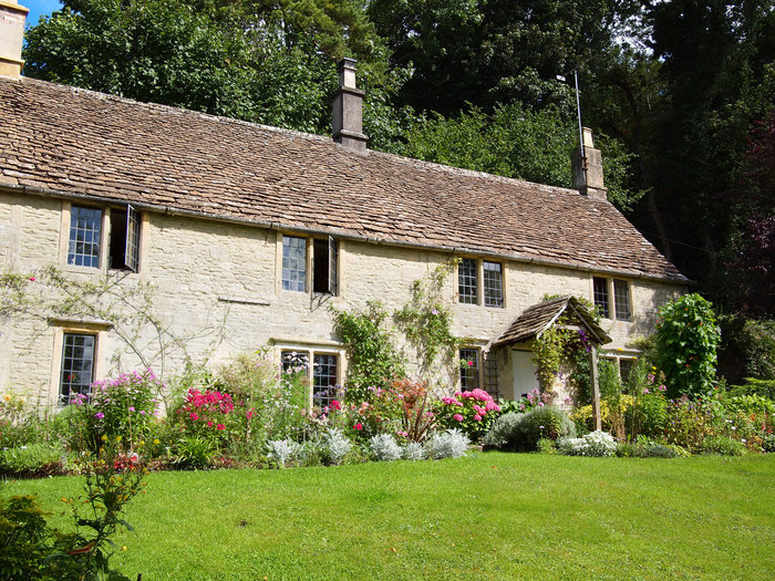 An English cottage built out of Cotswold stone with stone tiles on the roof, called slates, with a garden full of flowers and a grass lawn in the Cotswolds, England, UK. Profile Photos of The Personal Property Shop Tocher House,Start Hill, Bishops Stortford, Herts, CM22 7TA - Photo 8 of 11 An English cottage built out of Cotswold stone with stone tiles on the roof, called slates, with a garden full of flowers and a grass lawn in the Cotswolds, England, UK. Profile Photos of The Personal Property Shop Tocher House,Start Hill, Bishops Stortford, Herts, CM22 7TA - Photo 8 of 11