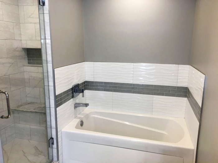 Bathroom remodeling Chicago - bathtub sliding doors and white tiles<br />
Bathroom remodeling Chicago of U.S. Home Construction Inc. 3456 N Harlem Ave - Photo 8 of 21 Bathroom remodeling Chicago - bathtub sliding doors and white tiles<br />
Bathroom remodeling Chicago of U.S. Home Construction Inc. 3456 N Harlem Ave - Photo 8 of 21