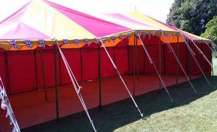 red and yellow marquee  tent hire marquee hire of Bigtopmania Swallowcroft, Chapmans well - Photo 36 of 57