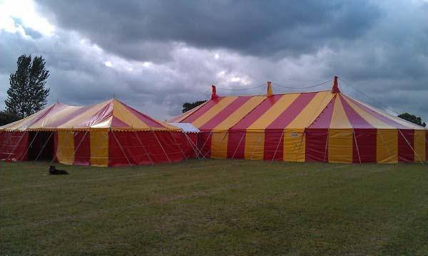 red and yellow striped marquee marquee hire of Bigtopmania Swallowcroft, Chapmans well - Photo 30 of 57