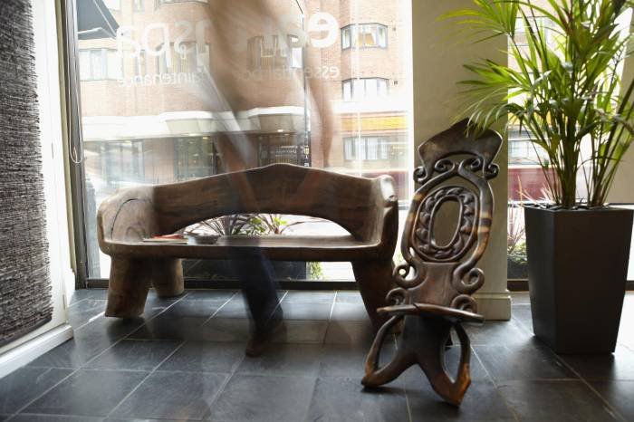 Phillipines carved bench in earthspa reception. earthspa premises of earthspa Chantrey House - Photo 2 of 2