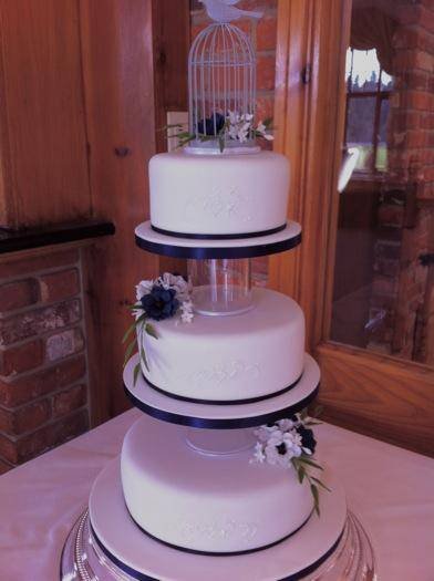 Blue and white anemones with vintage birdcage from £410 Profile Photos of Sharon Lord Cakes Fiddlers Field Croydon Road - Photo 21 of 21 Blue and white anemones with vintage birdcage from £410 Profile Photos of Sharon Lord Cakes Fiddlers Field Croydon Road - Photo 21 of 21