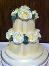White chocolate and fresh roses Â£165 excl roses Sharon Lord Cakes Fiddlers Field Croydon Road 
