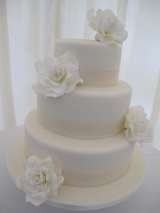 Sheer ribbon and sugar roses from Â£365<br />
 Sharon Lord Cakes Fiddlers Field Croydon Road 