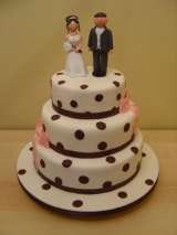 Dotty wedding with claydough bride and groom from Â£360 Sharon Lord Cakes Fiddlers Field Croydon Road 