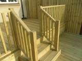 Decking with steps and spindles in East London. C&J Landscapes Ltd C&J Landscapes Ltd - Landscapers in East London Unit 1, 59 Browns Road 
