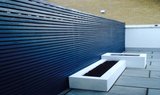 Hardwood decking, paving and flower beds in East London. C&J Landscapes Ltd C&J Landscapes Ltd - Landscapers in East London Unit 1, 59 Browns Road 