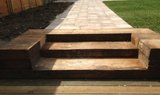 Railway sleepers and steps and paving in East London. C&J Landscapes Ltd C&J Landscapes Ltd - Landscapers in East London Unit 1, 59 Browns Road 