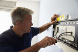 TV mounting with a spirit level, NYC TV Mounting & Home Theatre Installers, New York