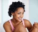 Lost in thought- Closeup of a casual sweet black girl smiling, Hope Pregnancy Center Tulsa, Tulsa