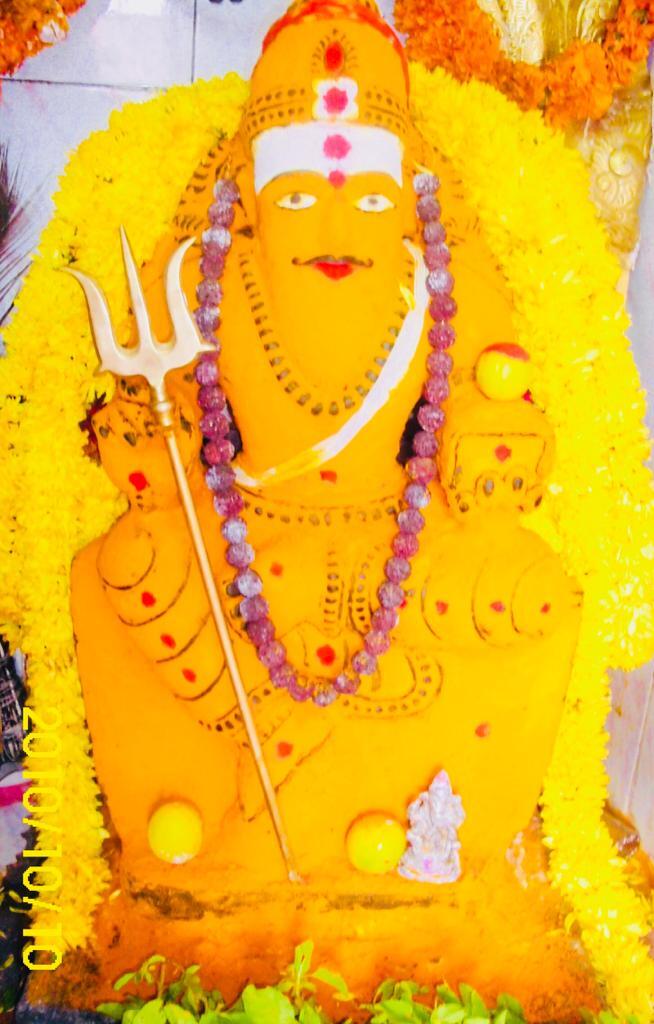 Muneshwara Swamy in Turmeric Alangara V2 Temple Photos of Sri Muneshwara Swamy Temple and Astrology Center Bazaar Street Someshwarpura, Halasuru - Photo 2 of 4