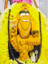 Muneshwara Swamy in Turmeric Alangara, Sri Muneshwara Swamy Temple and Astrology Center, Bangalore