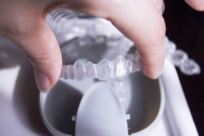 A close-up shot of invisalign braces and tray<br />
 New Album of Dentistry at The Grove 2142 Mountain Grove Ave - Photo 9 of 11
