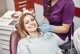 A close up picture of a patient getting a dental check-up<br />
 Dentistry at The Grove 2142 Mountain Grove Ave 