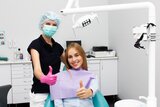 A happy dentist and patient post procedure
, Dentistry at The Grove, Burlington