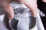 A close-up shot of invisalign braces and tray
, Dentistry at The Grove, Burlington