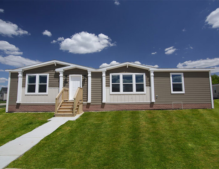  New Album of Village Square Manufactured Home Community 875 W Grand River Ave - Photo 1 of 9
