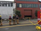 Warehouse building fire and firemen making cetain there are no additional flames.  Alarms and sprinkler system work. Building Insurance & Risk 16905 Chapin Way 