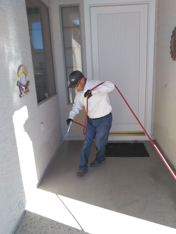 Croach technician working outdoor front entrance Profile Photos of Croach Pest Control 28 Boland Court, Unit 28 - Photo 8 of 12