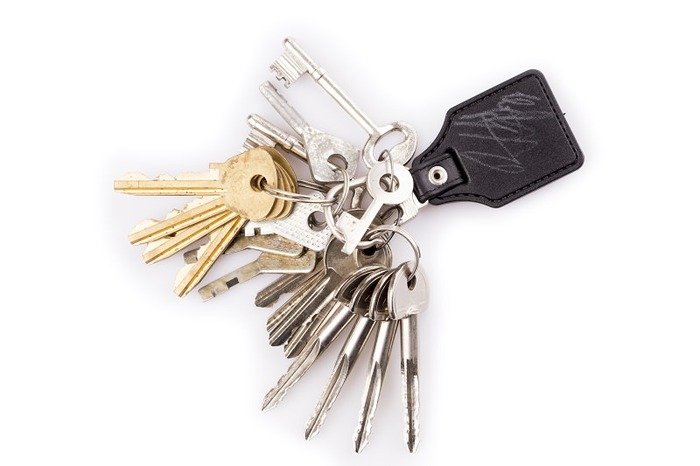 Bunch of keys and leather keychain on white Profile Photos of BH Locksmith 7924 Hillcroft Ave. - Photo 4 of 4