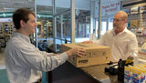 Associate Serving Customer at Checkout, HiFi Buys, Nashville