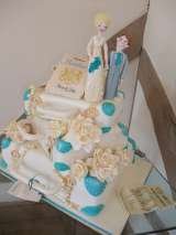 Romantic wedding cake with handmade sugar figures and embellishments , Cake by Nina, Camberley