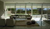 Shadows fall late in the day on the open living space at one of the model homes at Escena, May 28, 2013 in Palm Springs, California. Escena is billed as the first genuinely modern tract home development in Southern California in decades. The floor to ceil, Blinds-n-Shutters, Thornton