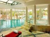 The elegant white interior and the heated indoor pool let the day quietly end. The St. Regis Mardavall Mallorca Resort Passeig Calvia s/n 