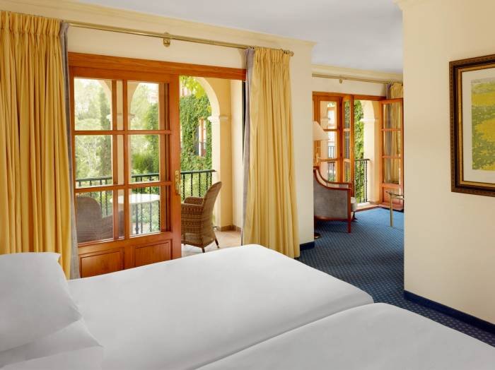 Enjoy the Mediterranean atmosphere at our Deluxe Room, while having a drink on the balcony with captivating views. Profile Photos of Sheraton Mallorca Arabella Golf Hotel Carrer de Vinagrella, Urbanization Son Vida - Photo 6 of 23 Enjoy the Mediterranean atmosphere at our Deluxe Room, while having a drink on the balcony with captivating views. Profile Photos of Sheraton Mallorca Arabella Golf Hotel Carrer de Vinagrella, Urbanization Son Vida - Photo 6 of 23