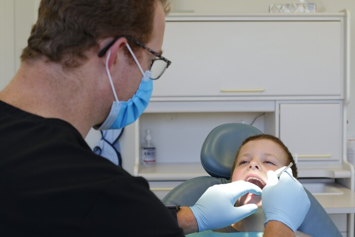 Oakville dentist Dr. Jacobs with pediatric patient at Jacobs & Associates Dental Office Oakville dentist of Jacobs & Associates Dental Office 1060 Speers Road Suite 218 - Photo 14 of 22 Oakville dentist Dr. Jacobs with pediatric patient at Jacobs & Associates Dental Office Oakville dentist of Jacobs & Associates Dental Office 1060 Speers Road Suite 218 - Photo 14 of 22
