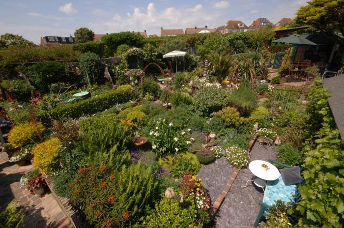 GEOFF STONEBANKS WITH HIS DRIFTWOOD GARDEN IN SEAFORD, WEST SUSSEX, WHICH HE OPENS TO RAISE MONEY FOR CHARITY.©RUSSELL SACH - 0771 882 6138 Profile Photos of Driftwood Open Garden 4 MARINE DRIVE - Photo 1 of 8 GEOFF STONEBANKS WITH HIS DRIFTWOOD GARDEN IN SEAFORD, WEST SUSSEX, WHICH HE OPENS TO RAISE MONEY FOR CHARITY.©RUSSELL SACH - 0771 882 6138 Profile Photos of Driftwood Open Garden 4 MARINE DRIVE - Photo 1 of 8