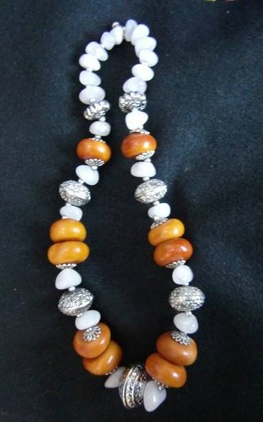 http://www.craftsoftheworldonline.com/Jewellery/BERBER NECKLACE WITH AMBER/MADREPORA BEADS <br />
£18.50, free delivery<br />
Tribal Chic of Crafts of the World Online 15 High Street - Photo 6 of 8 http://www.craftsoftheworldonline.com/Jewellery/BERBER NECKLACE WITH AMBER/MADREPORA BEADS <br />
£18.50, free delivery<br />
Tribal Chic of Crafts of the World Online 15 High Street - Photo 6 of 8