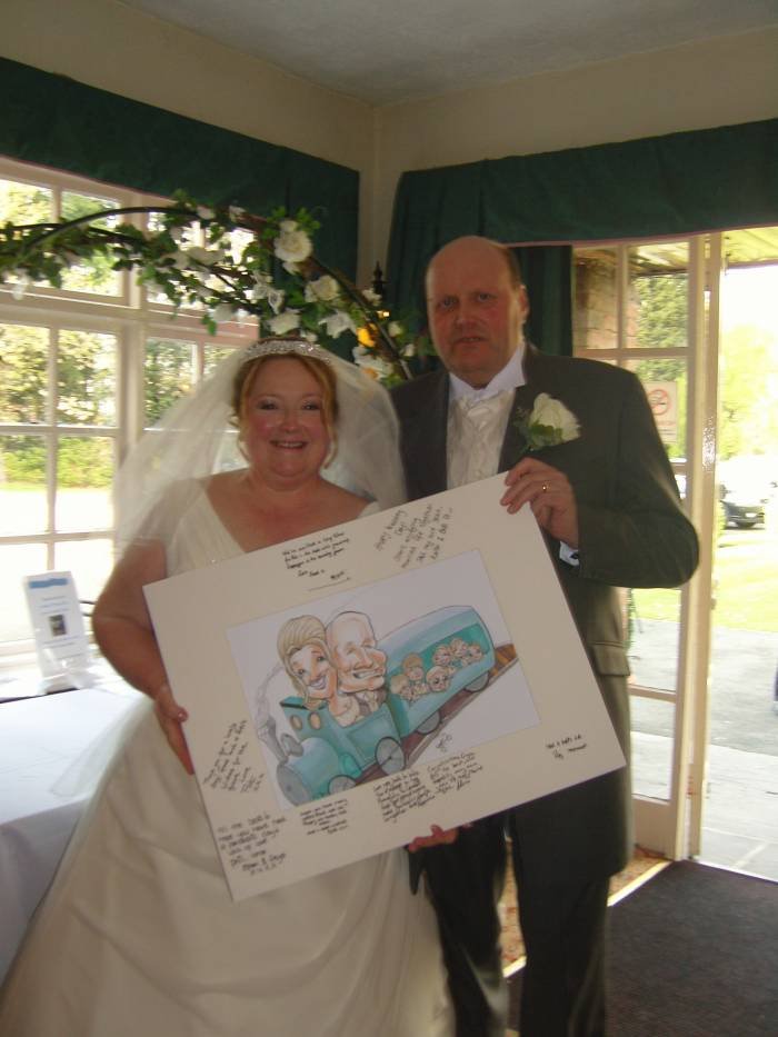Dot and Mick.<br />
The Happy Couple with their Wedding Caricature and signing in board. Profile Photos of Crazy Caricatures St Mary Street - Photo 17 of 19 Dot and Mick.<br />
The Happy Couple with their Wedding Caricature and signing in board. Profile Photos of Crazy Caricatures St Mary Street - Photo 17 of 19