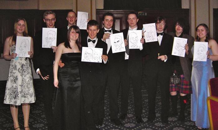 A group of happy  young people at a Ball. Profile Photos of Crazy Caricatures St Mary Street - Photo 1 of 11