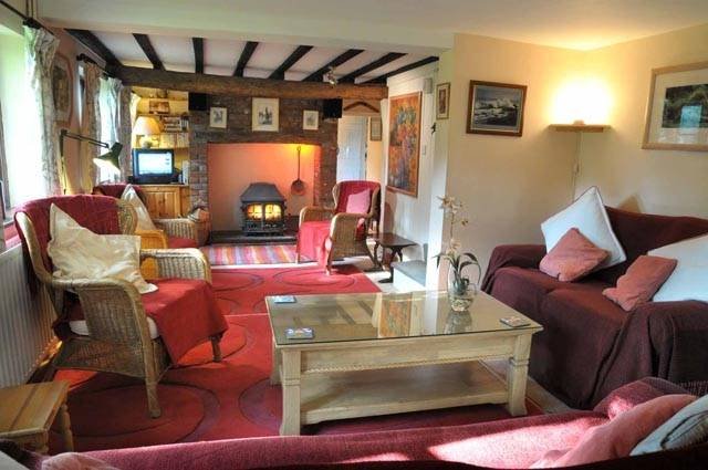 Sittingroom with woodburner Profile Photos of Pollywiggle Cottage 40 The Drove, West Raynham - Photo 1 of 9