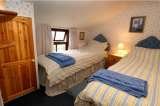 North-facing twin children's bedroom, Pollywiggle Cottage, Fakenham