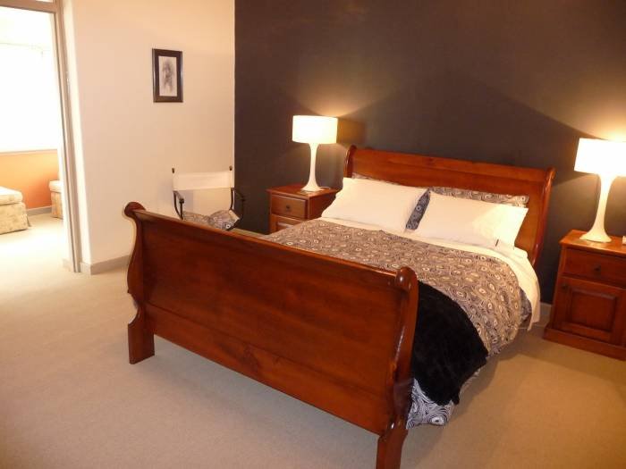 Main Queen Bedroom.  opens on to reading sun room.  Reverse Cycle air conditioning  Profile Photos of Country bakehouse Accommodation Main Street - Photo 3 of 11