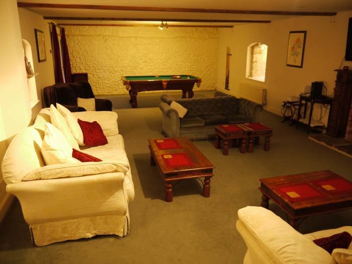 Sitting room in The Chapel by the staircase Internal photos of holiday properties. of Manston Court Accommodations Manston Court, Manston Court Road, Manston, - Photo 10 of 18