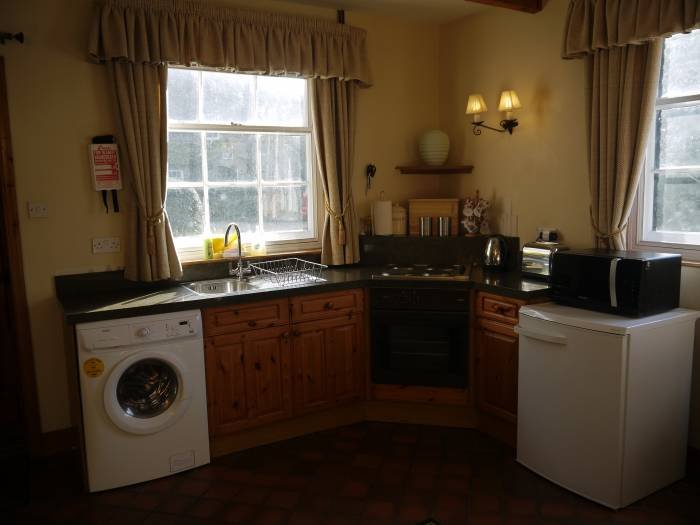 Kitchen area in Well Cottage Internal photos of holiday properties. of Manston Court Accommodations Manston Court, Manston Court Road, Manston, - Photo 8 of 18