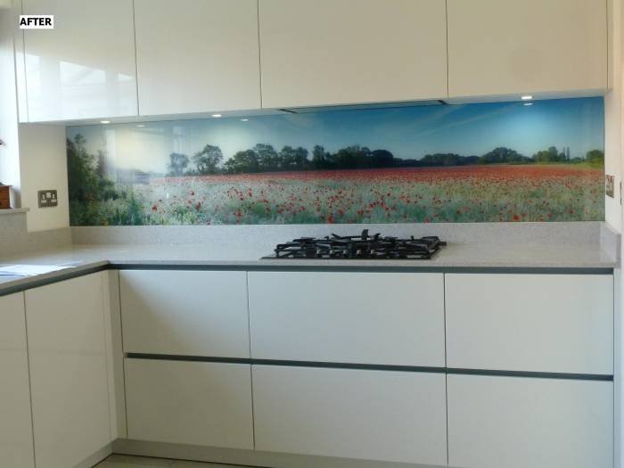 After - High gloss white handless doors with Silestone quartz worktop and poppy field image on glass splash back. Extractor hidden in wall unit. Before&After of Intoto Kitchens Wokingham 23 Peach Street - Photo 16 of 25