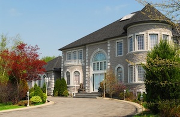 Front of a large beautiful executive home under blue sky Pricelists of Austin Roofing Contractors 7000 N. Mopac Expressway, Suite 200 - Photo 4 of 5