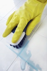 Scrubbing the floor, Cleaner Greenwich Ltd., London