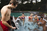 Man shows off a Bullfrog Spas jet system<br />
 Rocky Mountain Hot Tub Company 102 Continental Ct, C17 