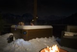 A couple enjoying their new hot tub in the winter time<br />
 Rocky Mountain Hot Tub Company 102 Continental Ct, C17 
