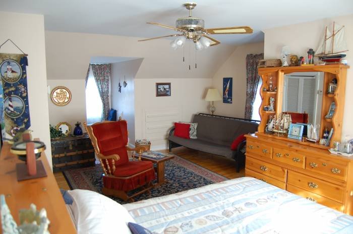 Our Harbour Captain's Suite features room for 3 or 4. Additional adult (1) $20. Children 7 - 15 years $15. each 2 maximum.<br />
3 piece bath ensuite, Full hot breakfast, No Tax. $119. (1 or 2 persons). New for 2017. A 32 Our Harbour Captain's Suite features room for 3 or 4. Additional adult (1) $20. Children 7 - 15 years $15. each 2 maximum.<br />
3 piece bath ensuite, Full hot breakfast, No Tax. $119. (1 or 2 persons). New for 2017. A 32