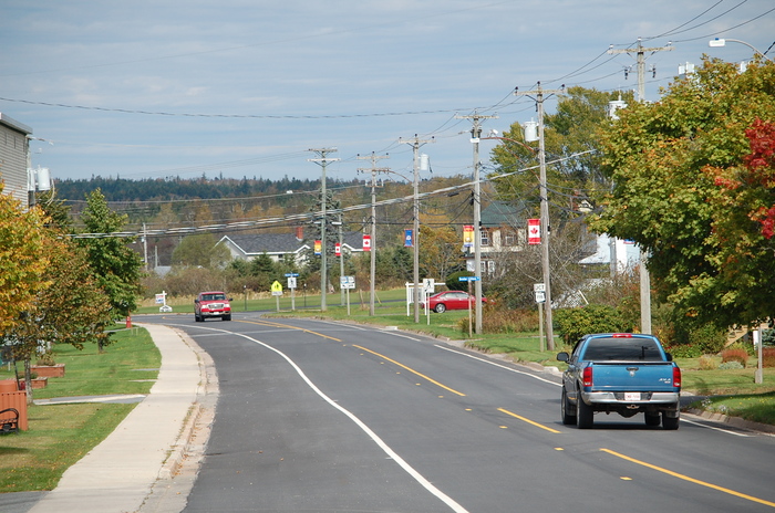 A view down Main street. We are on the curve past the far car. Blacks Harbour and Our Coastal Views of Harbour Tide Inn ~ Bed & Breakfast 725 Main Street - Photo 42 of 48